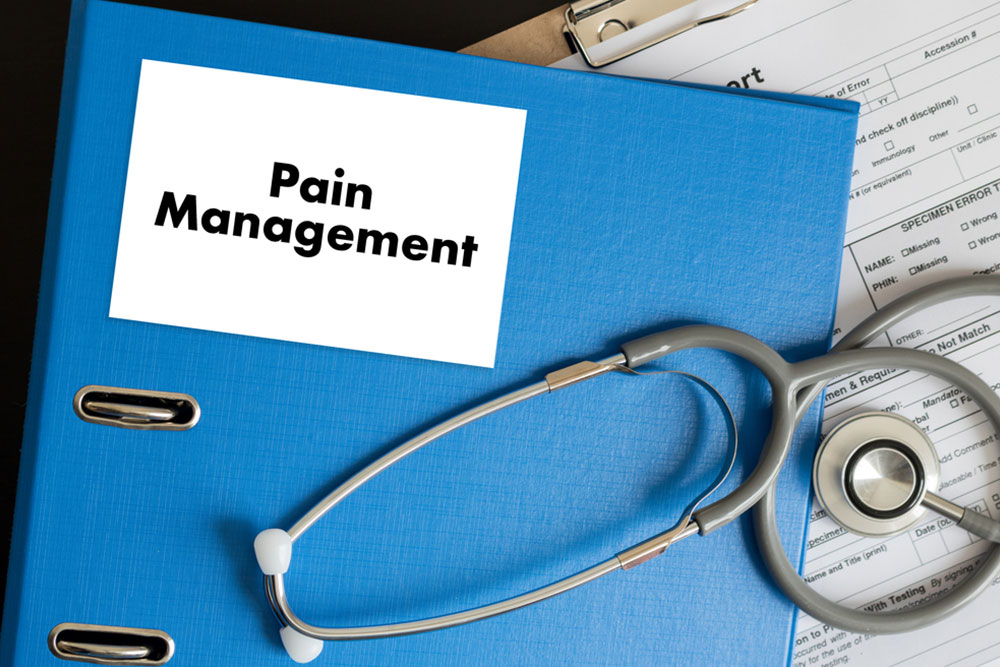 Pain Management Medical Concept doctor hand working